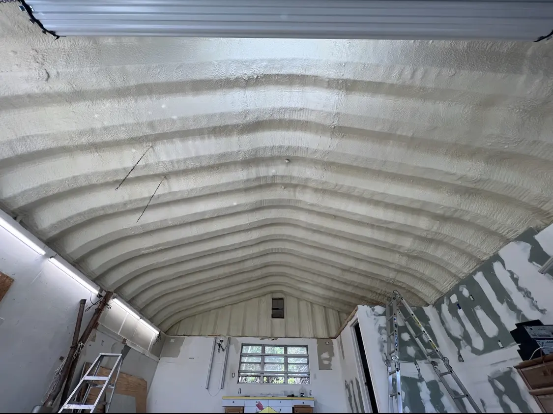 Spray polyurethane foam applied to the underside of a metal roof deck in Pendleton